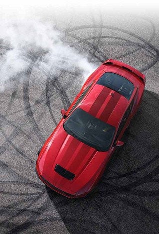 Overhead view of a 2024 Ford Mustang® model with tire tracks on pavement | LUV Ford in Henryetta OK